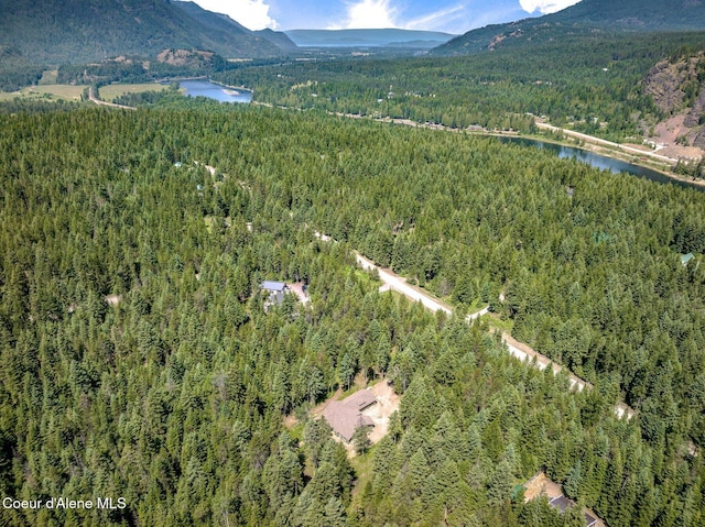 84 E Cabinet Wagon Rd, Clark Fork, ID 83811 - aerial view of property and surrounding area with a heavily wooded area and a water and mountain view