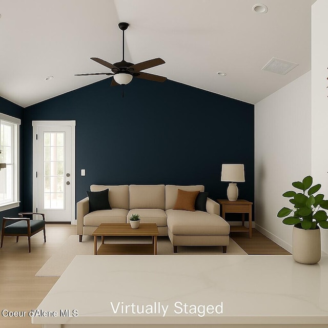 84 E Cabinet Wagon Rd, Clark Fork, ID 83811 - living area with lofted ceiling, a ceiling fan, light wood-style floors, and recessed lighting
