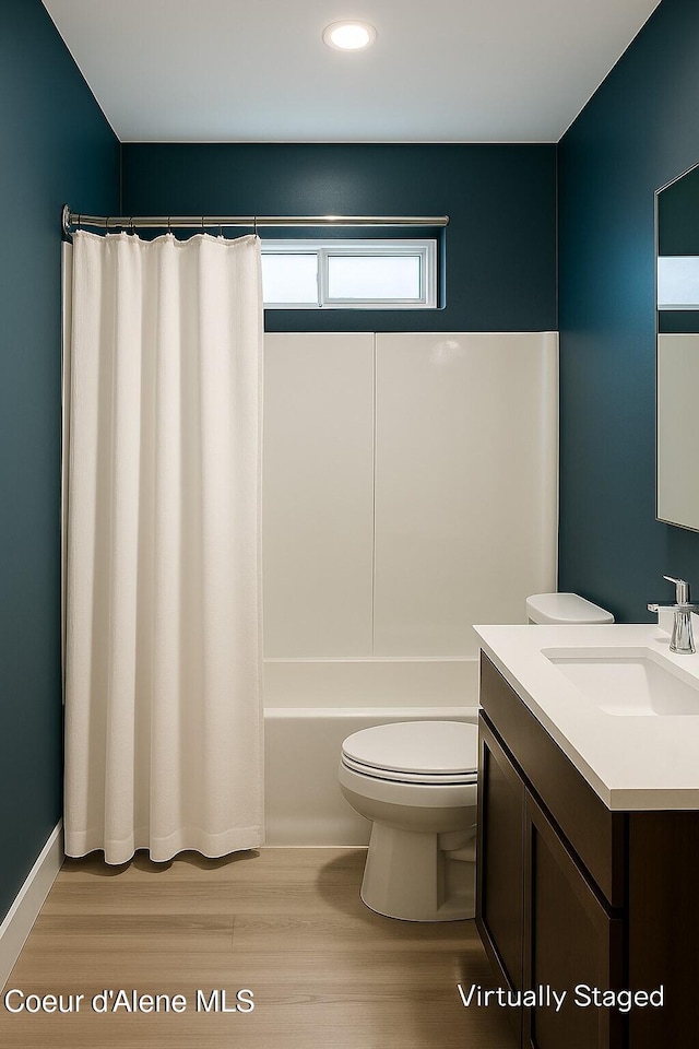 84 E Cabinet Wagon Rd, Clark Fork, ID 83811 - full bathroom featuring vanity, wood finished floors, shower / tub combo, and recessed lighting