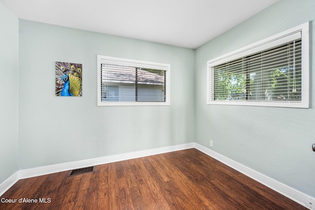 1215 N A St, Coeur Dalene, ID 83814 - unfurnished room featuring dark wood-style flooring