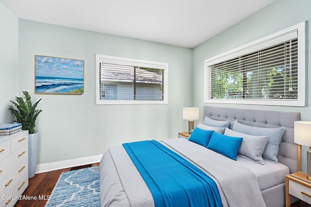 1215 N A St, Coeur Dalene, ID 83814 - bedroom featuring dark wood-style floors and baseboards