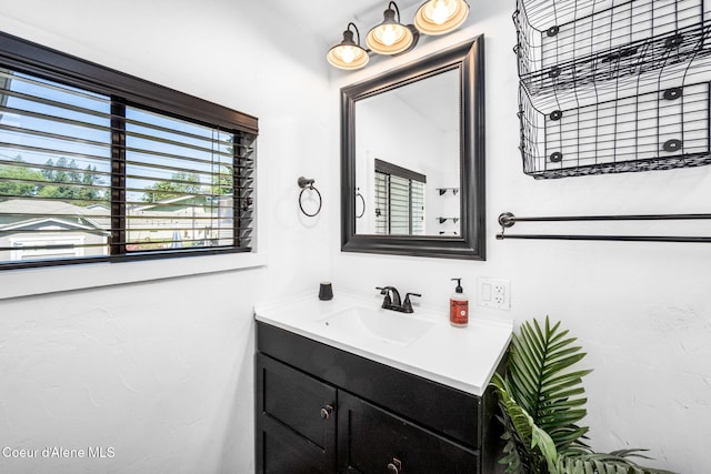 1215 N A St, Coeur Dalene, ID 83814 - bathroom with vanity and plenty of natural light
