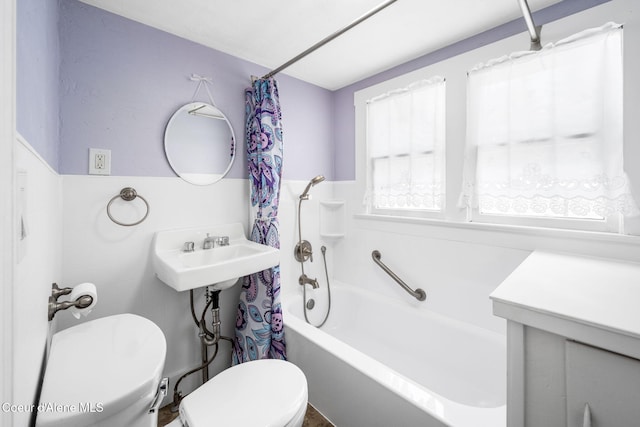 1215 N A St, Coeur Dalene, ID 83814 - full bathroom featuring shower / bath combination with curtain and wainscoting