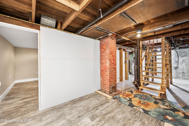1215 N A St, Coeur Dalene, ID 83814 - unfinished basement with wood finished floors and stairs