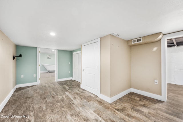 1215 N A St, Coeur Dalene, ID 83814 - finished basement with wood finished floors and baseboards
