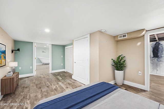 1215 N A St, Coeur Dalene, ID 83814 - bedroom with wood finished floors and baseboards