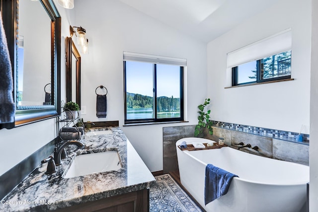 115 W Lakeview Blvd, Priest River, ID 83856 - bathroom featuring double vanity and a freestanding bath
