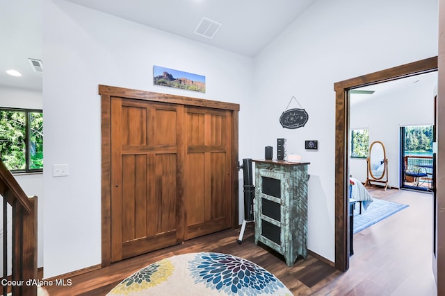 115 W Lakeview Blvd, Priest River, ID 83856 - foyer entrance with dark wood-type flooring, vaulted ceiling, and recessed lighting