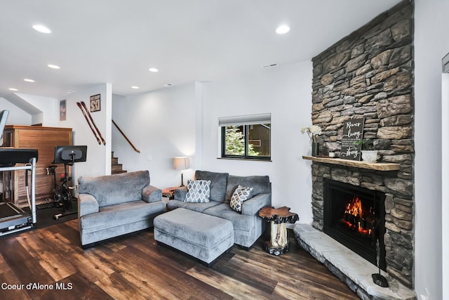 115 W Lakeview Blvd, Priest River, ID 83856 - living area featuring a stone fireplace, wood finished floors, recessed lighting, and stairway