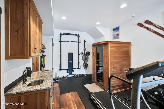 115 W Lakeview Blvd, Priest River, ID 83856 - workout area featuring wood finished floors, recessed lighting, and vaulted ceiling