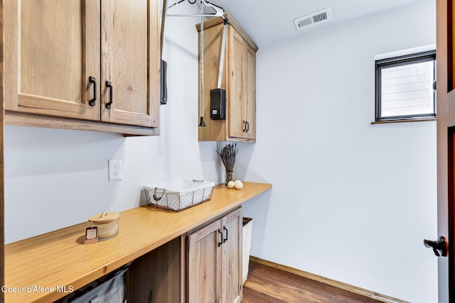 115 W Lakeview Blvd, Priest River, ID 83856 - kitchen featuring wood finished floors and light brown cabinets