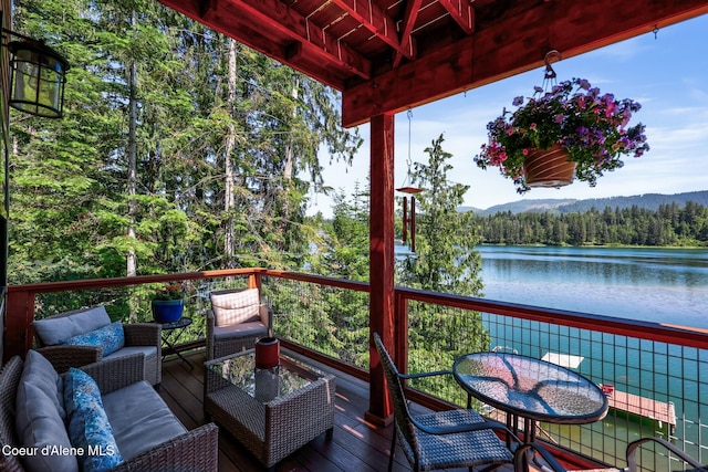 115 W Lakeview Blvd, Priest River, ID 83856 - wooden terrace with a wooded view and a water view