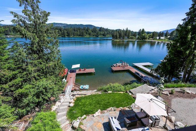 115 W Lakeview Blvd, Priest River, ID 83856 - dock area featuring a wooded view and a water and mountain view