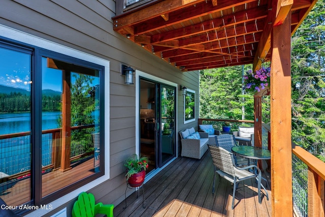 115 W Lakeview Blvd, Priest River, ID 83856 - wooden deck featuring an outdoor living space and a water view
