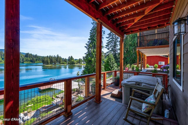 115 W Lakeview Blvd, Priest River, ID 83856 - wooden terrace with a water view, a forest view, and grilling area