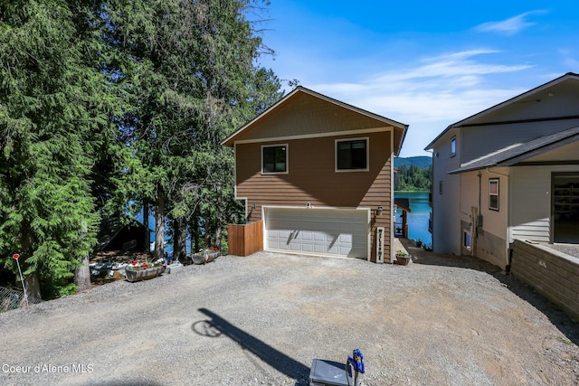 115 W Lakeview Blvd, Priest River, ID 83856 - view of front of property with driveway and a garage