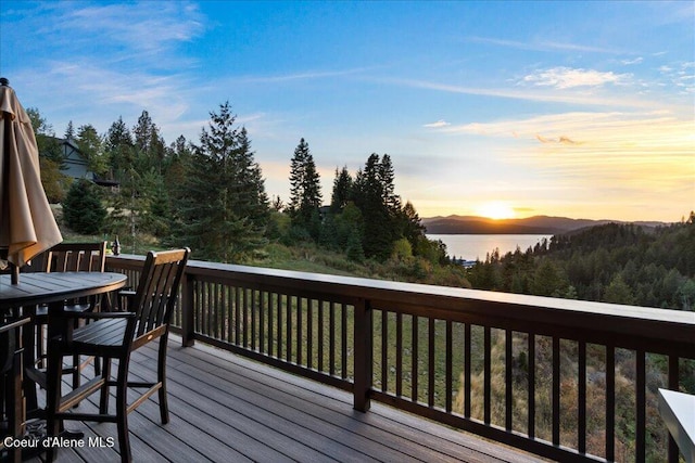 3889 E Avery Ln, Coeur Dalene, ID 83814 - deck at dusk featuring outdoor dining space