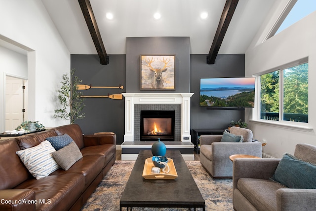 3889 E Avery Ln, Coeur Dalene, ID 83814 - living area featuring beam ceiling, recessed lighting, a fireplace, wood finished floors, and high vaulted ceiling