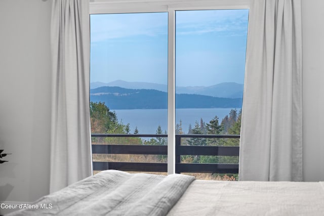 3889 E Avery Ln, Coeur Dalene, ID 83814 - bedroom with a water and mountain view