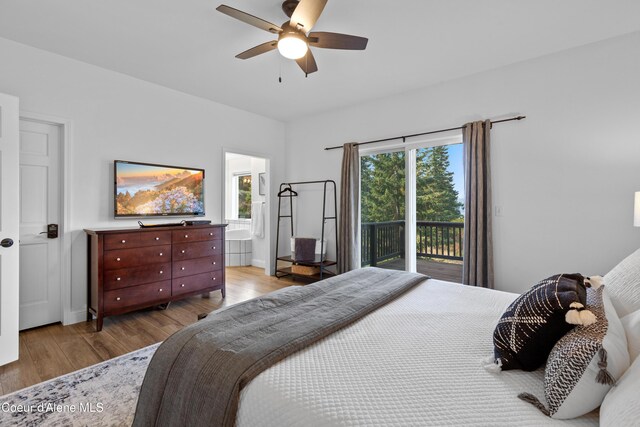 3889 E Avery Ln, Coeur Dalene, ID 83814 - bedroom with access to exterior, light wood-style floors, ceiling fan, and connected bathroom
