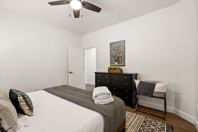 3889 E Avery Ln, Coeur Dalene, ID 83814 - bedroom featuring wood finished floors and ceiling fan
