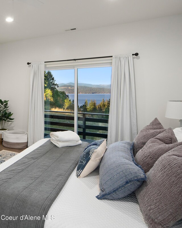 3889 E Avery Ln, Coeur Dalene, ID 83814 - bedroom with a water view