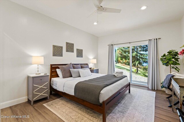 3889 E Avery Ln, Coeur Dalene, ID 83814 - bedroom featuring access to outside, wood finished floors, recessed lighting, and a ceiling fan