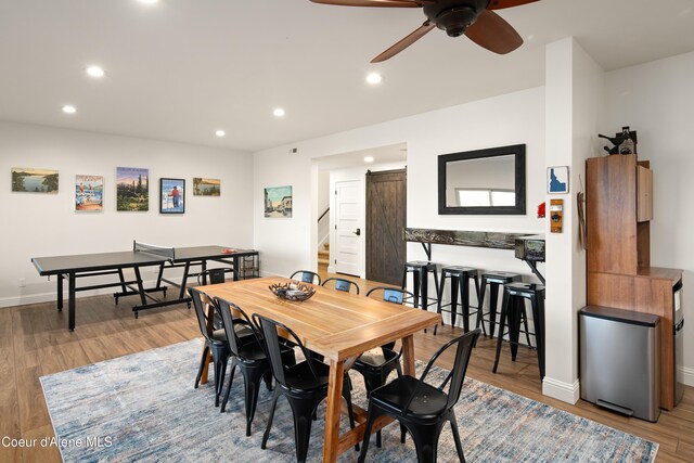 3889 E Avery Ln, Coeur Dalene, ID 83814 - dining space featuring stairs, ceiling fan, recessed lighting, and wood finished floors
