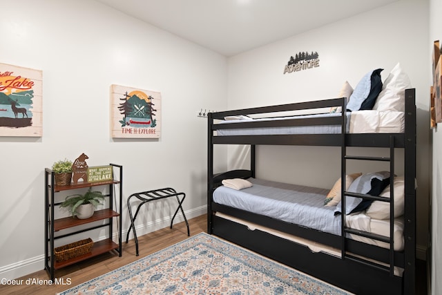 3889 E Avery Ln, Coeur Dalene, ID 83814 - bedroom with baseboards and wood finished floors