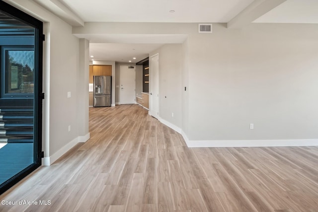 503 Cedar St # 203, Sandpoint, ID 83864 - unfurnished living room featuring light wood finished floors and recessed lighting