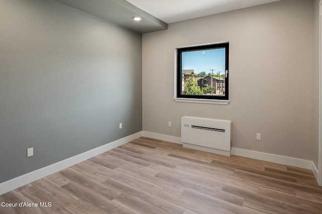 503 Cedar St # 203, Sandpoint, ID 83864 - empty room with light wood finished floors and recessed lighting