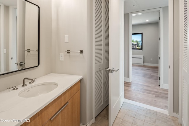 503 Cedar St # 203, Sandpoint, ID 83864 - bathroom featuring a closet, vanity, tile patterned floors, and recessed lighting
