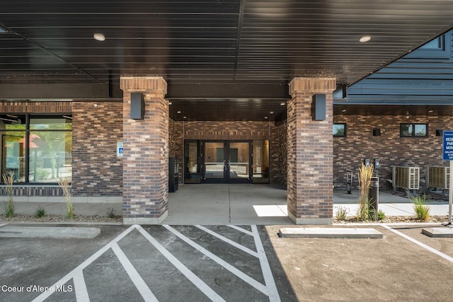 503 Cedar St # 203, Sandpoint, ID 83864 - doorway to property featuring french doors and brick siding