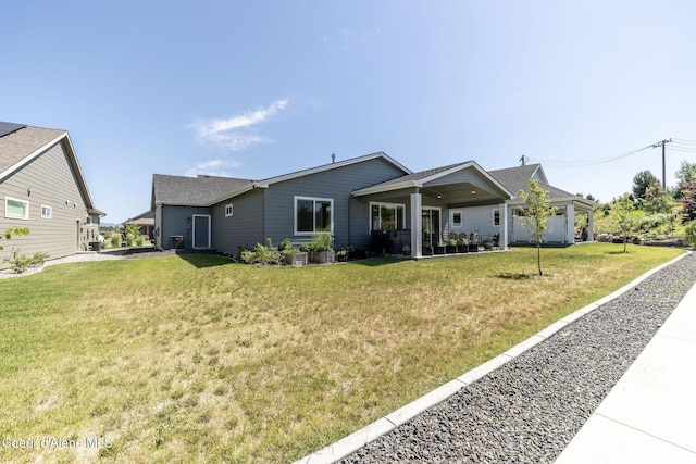 22830 E Bailey Ct, Liberty Lake, WA 99019 - rear view of house featuring a yard and a patio area