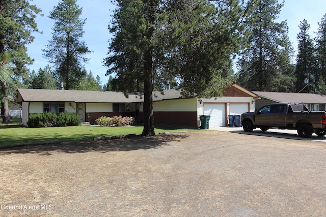 807809 E Timber Ln, Coeur Dalene, ID 83814 - ranch-style house featuring a garage, dirt driveway, and a front yard