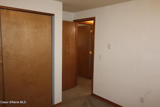 807809 E Timber Ln, Coeur Dalene, ID 83814 - hallway featuring carpet and baseboards
