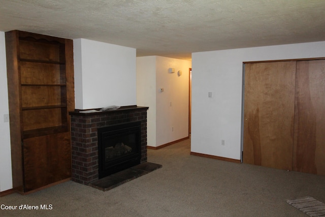 807809 E Timber Ln, Coeur Dalene, ID 83814 - unfurnished living room with carpet floors, a fireplace, and a textured ceiling