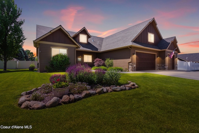 6984 W Blacktail Ave, Rathdrum, ID 83858 - craftsman inspired home with a garage, board and batten siding, concrete driveway, and roof with shingles