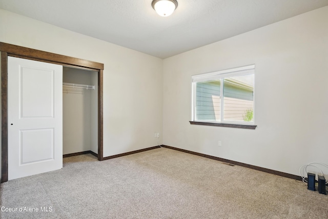 6984 W Blacktail Ave, Rathdrum, ID 83858 - unfurnished bedroom featuring light colored carpet and a closet