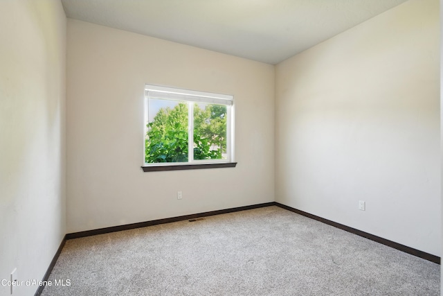 6984 W Blacktail Ave, Rathdrum, ID 83858 - carpeted empty room featuring baseboards