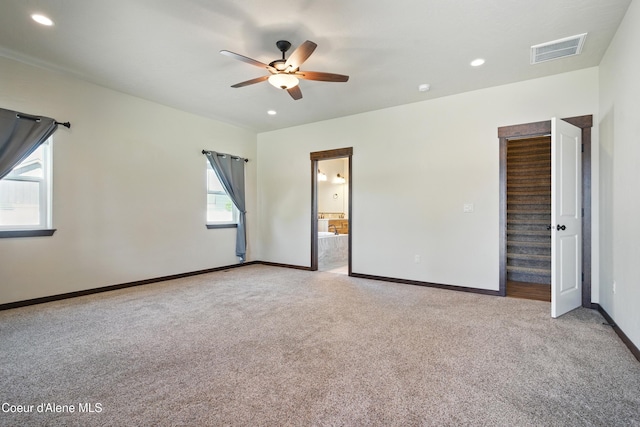 6984 W Blacktail Ave, Rathdrum, ID 83858 - unfurnished bedroom with carpet flooring, recessed lighting, a ceiling fan, and ensuite bathroom
