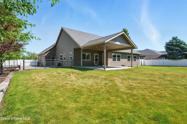 6984 W Blacktail Ave, Rathdrum, ID 83858 - rear view of property featuring a patio and a shingled roof
