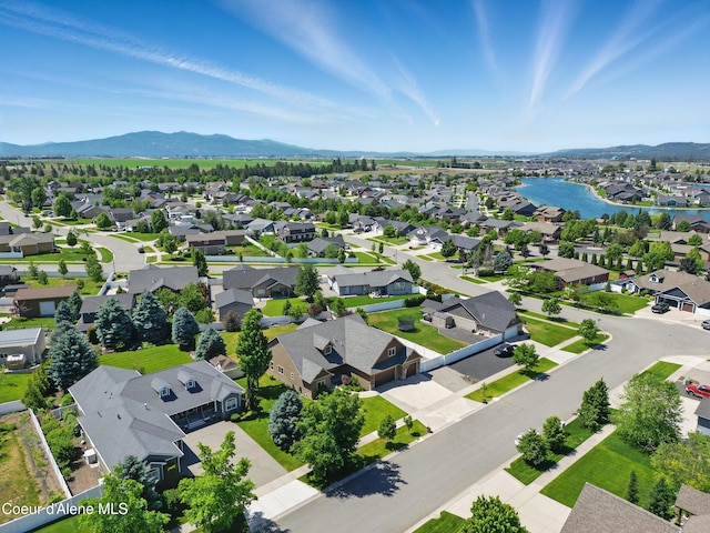 6984 W Blacktail Ave, Rathdrum, ID 83858 - aerial view of residential area with a water and mountain view