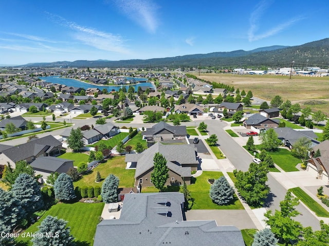 6984 W Blacktail Ave, Rathdrum, ID 83858 - aerial view of residential area featuring a water and mountain view