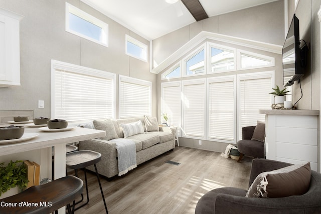 716 Raeder St, Kooskia, ID 83539 - living room featuring high vaulted ceiling, light wood finished floors, and beam ceiling