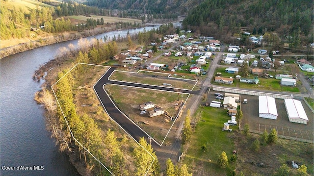 716 Raeder St, Kooskia, ID 83539 - aerial view of property and surrounding area with a large body of water and a forest