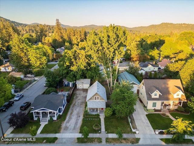 928 N 7th St, Coeur Dalene, ID 83814 - drone / aerial view of a forest and a mountain backdrop