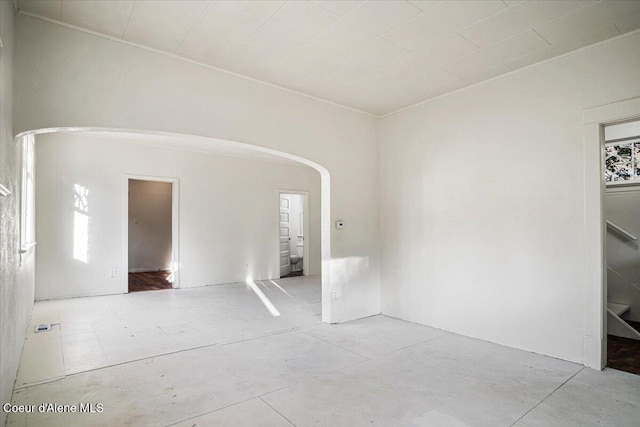 928 N 7th St, Coeur Dalene, ID 83814 - unfurnished room with arched walkways and concrete flooring