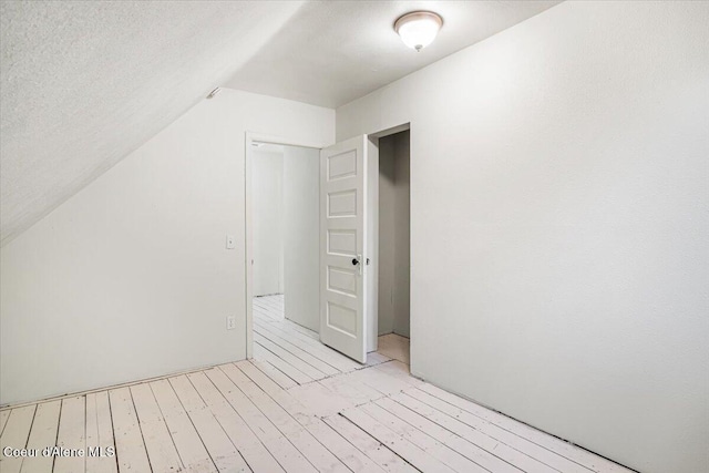 928 N 7th St, Coeur Dalene, ID 83814 - additional living space with light wood finished floors and lofted ceiling
