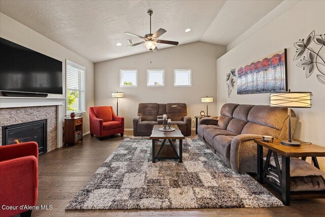 3265 E Galway Cir, Post Falls, ID 83854 - living area with wood finished floors, ceiling fan, vaulted ceiling, a fireplace, and recessed lighting
